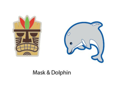 Tuva GAMMA STRING THINGS MASK/DOLPHIN vibrāciju slāpētāju fotogrāfija uz balta fona — divi jautri tenisa raketes stīgu vibrāciju samazinātāji